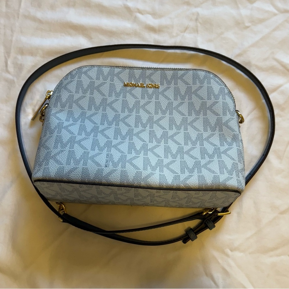 Michael Kora Jet Set Travel Crossbody Blue Logo
